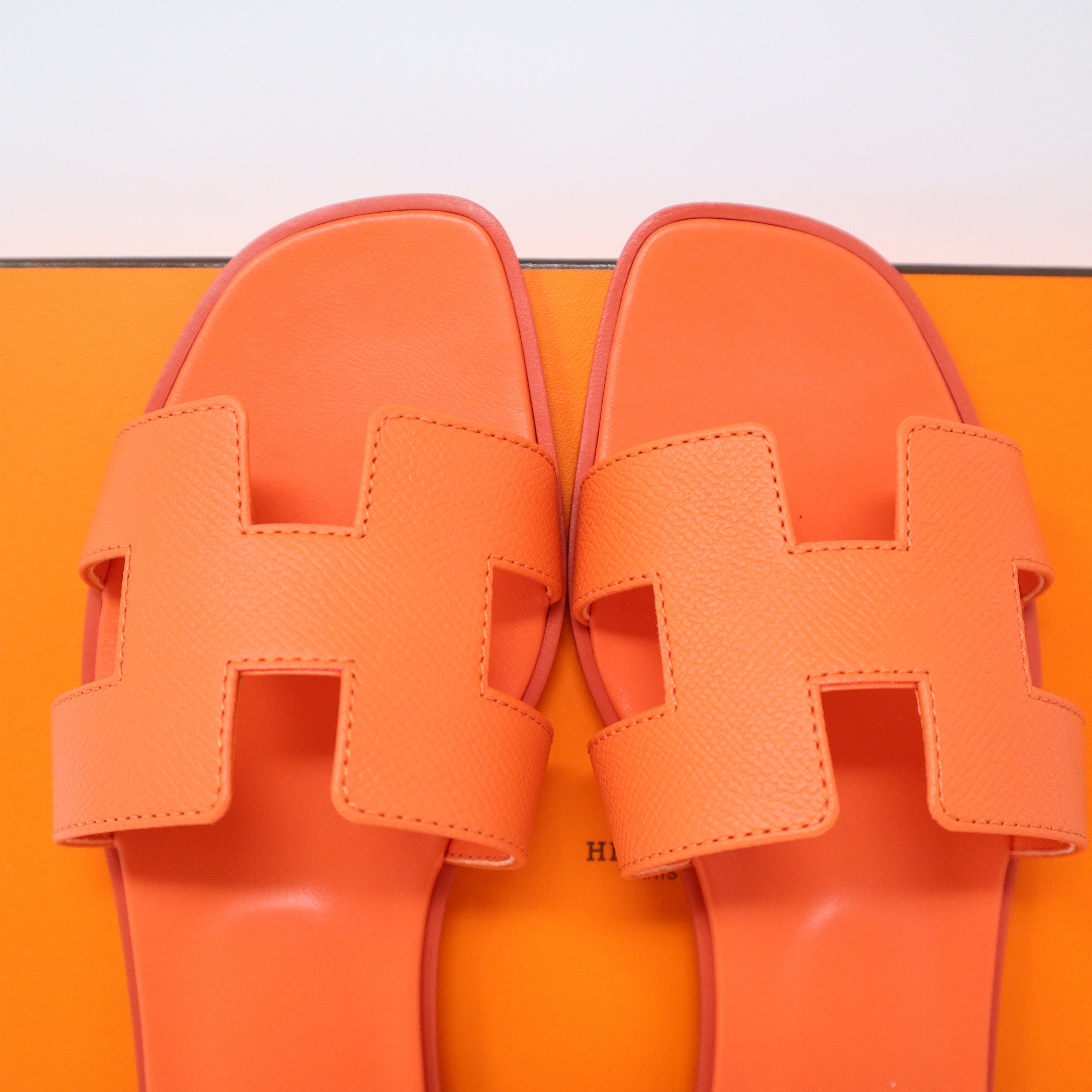Sz36.5 brand new hermes Oran sandal in ostrich tangerine color